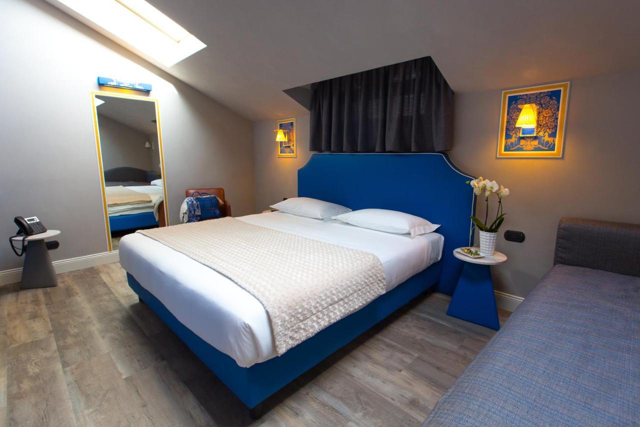Hotel Al Campanile - Luxury Suites & Apartments Baveno Exterior photo