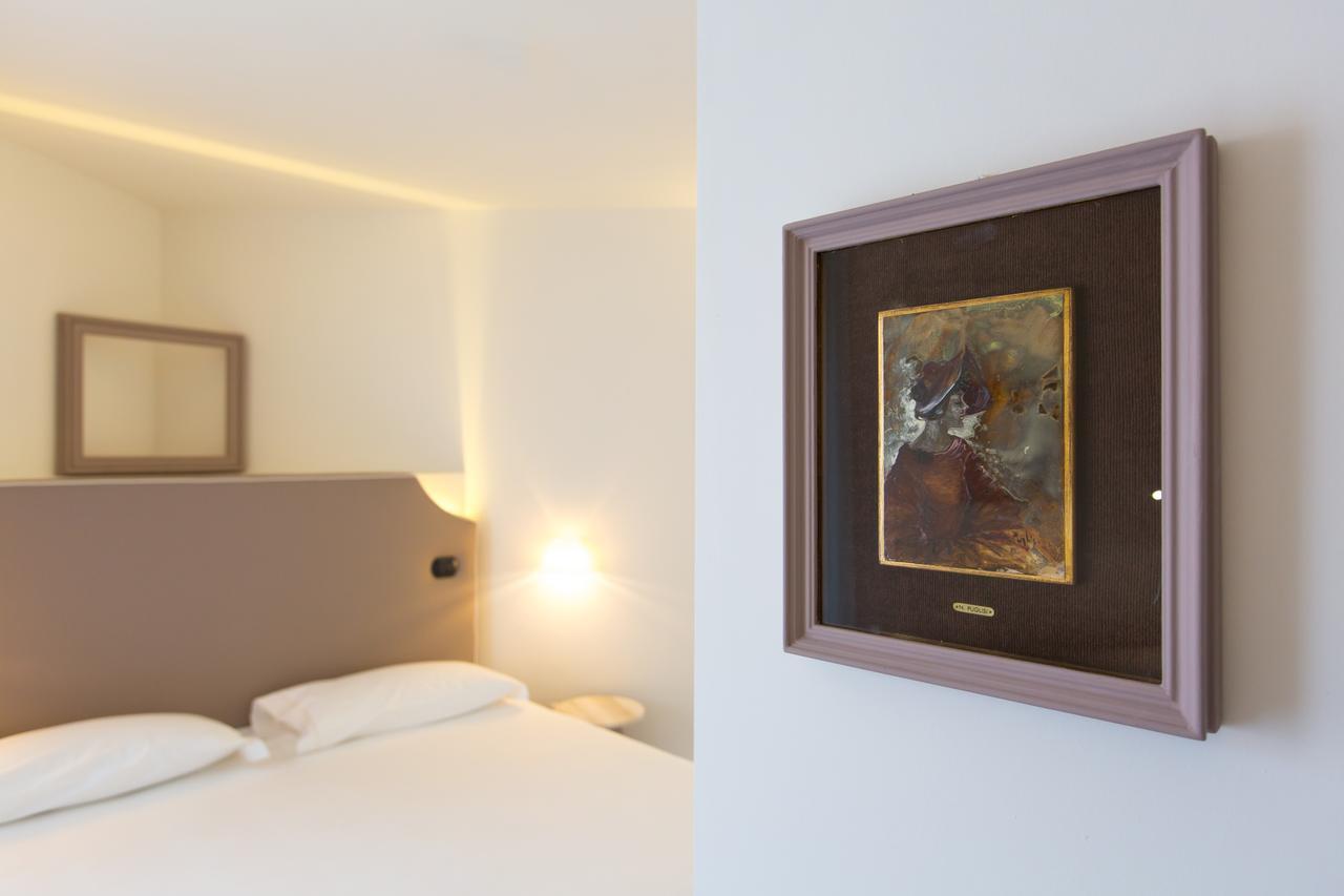 Hotel Al Campanile - Luxury Suites & Apartments Baveno Exterior photo